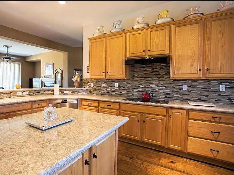 After Remodel - kitchen with Cambria counter and Palm Tile and Stone - Leslie Kate photo sacramento