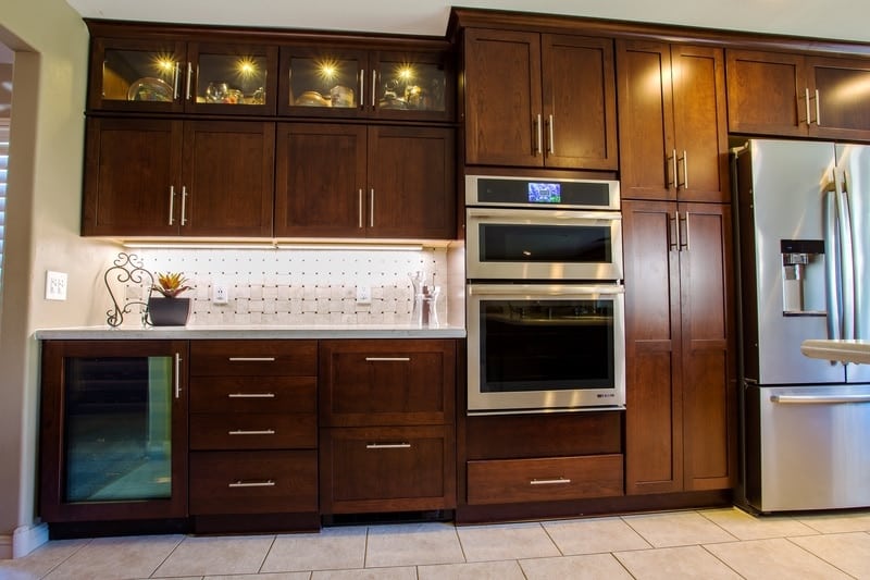 Kraftmaid lighted cabinets in Kaffe finish