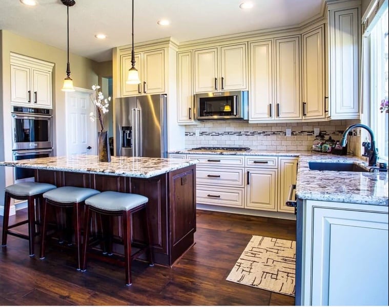 Copenhagen granite counter and KraftMaid cabinets in remodeled kitchen