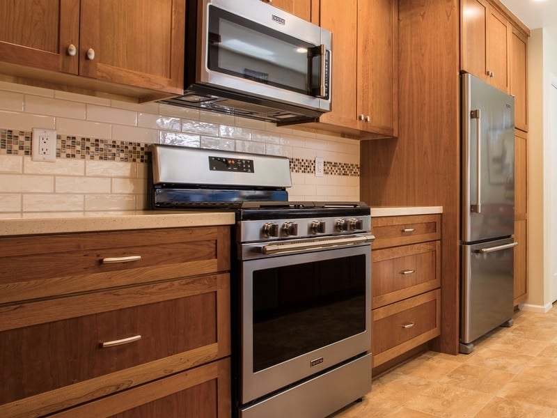 Kitchen oven and Corian Quartz Sagebrush color counter top view