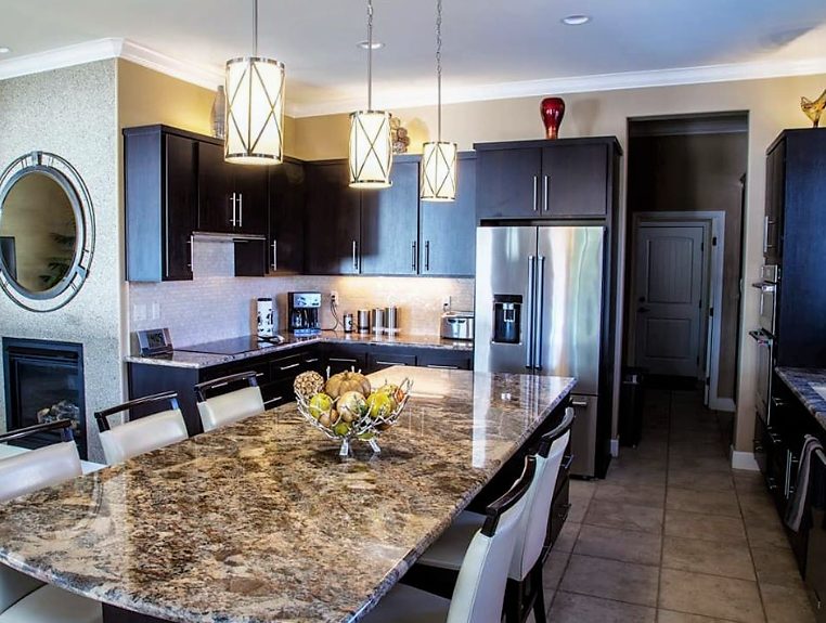 Remodeled Kitchen with Wenge finished slab cabinets and granite counters in Sacramento