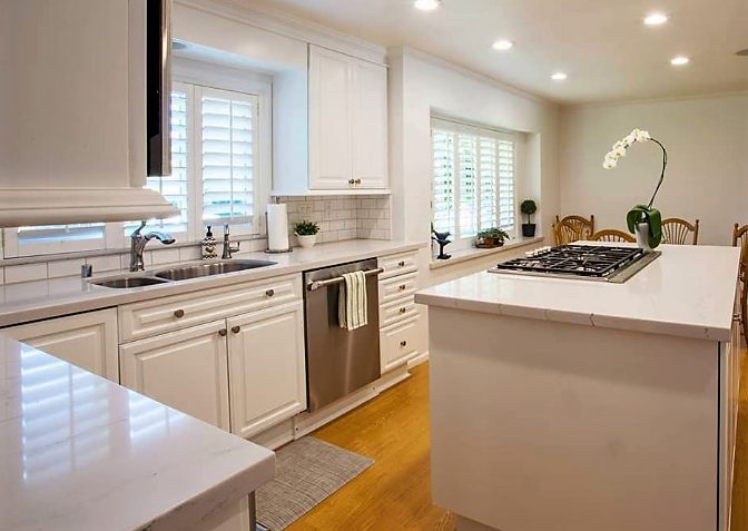 Remodeled White Kitchen with Ella by Cambria Counter tops