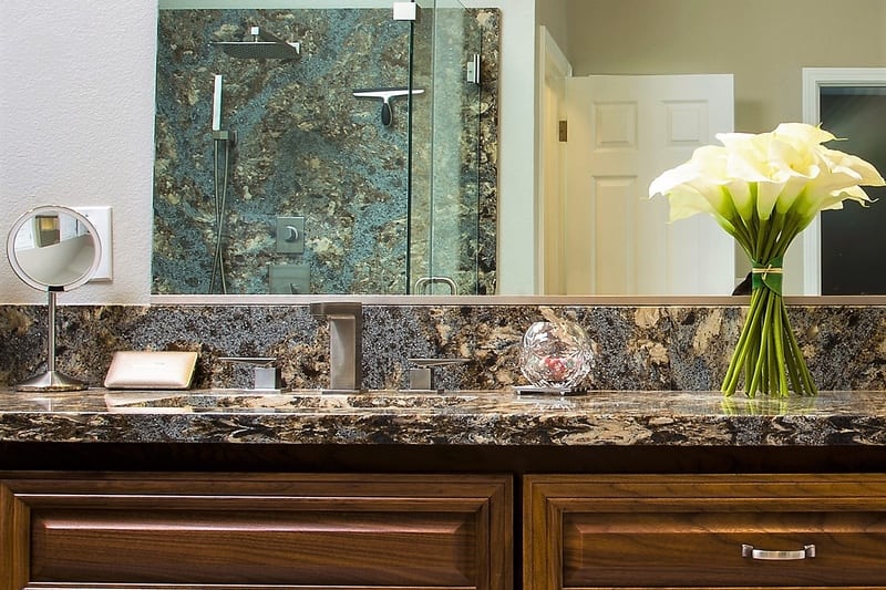 close up of bathroom vanity brown wood cabinets