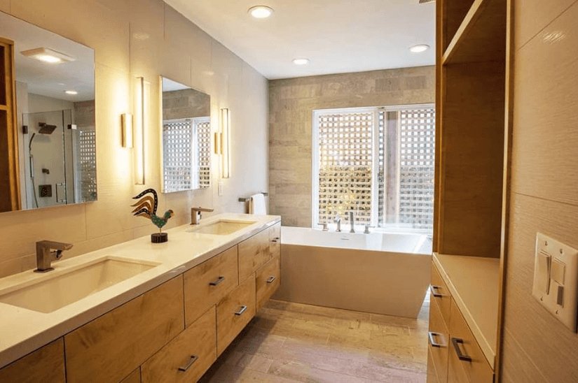 full bathroom remodel with floating cabinets in maple