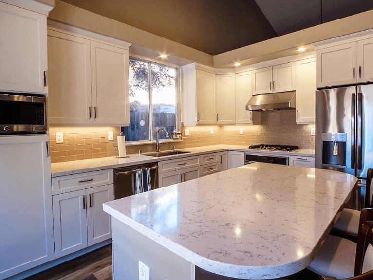 modern kitchen in white and gray with custom cabinetry