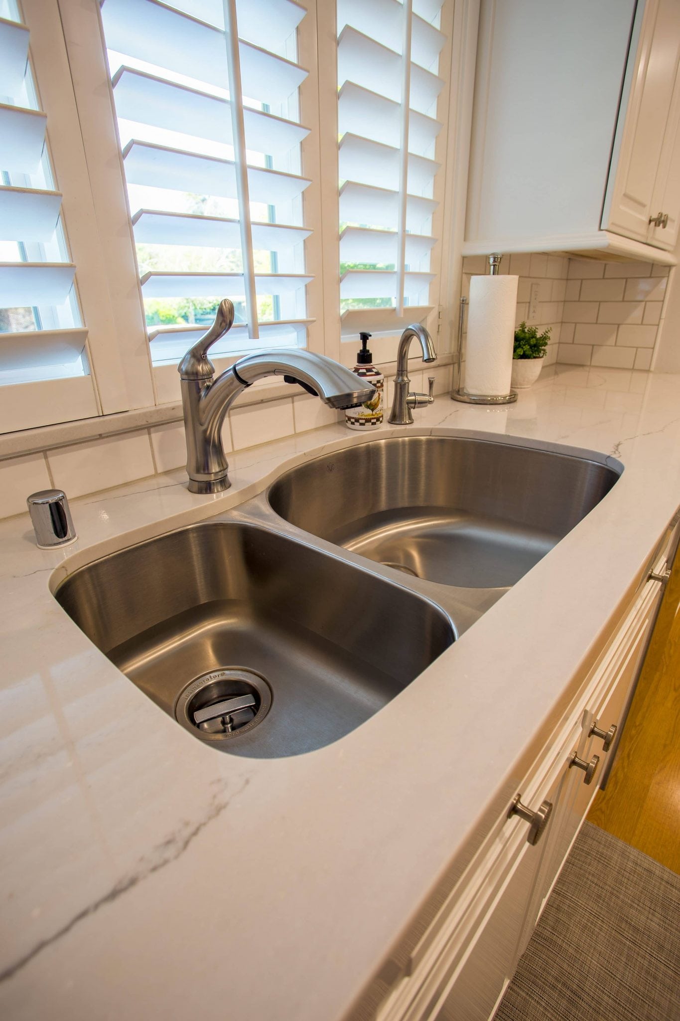 white kitchen sink view Leslie Kate photo